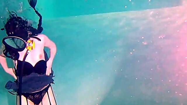 Cosplay bondage underwater