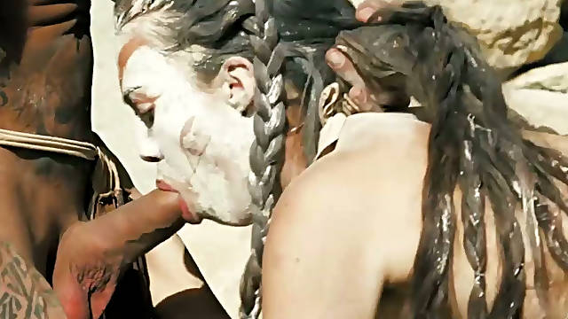 Tribal bitch Tiffany Doll gives blowjob to a duo of foreigners