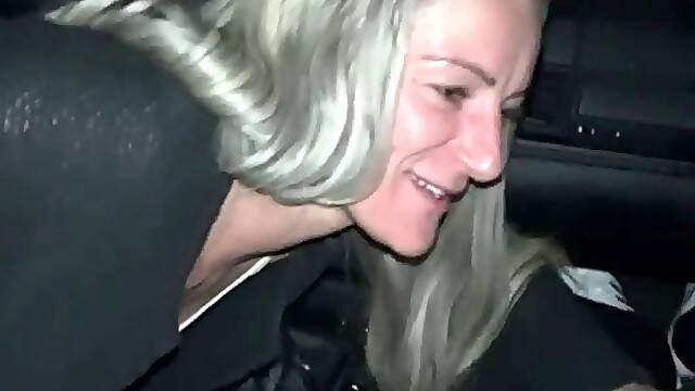 Blowjob in the car in a public parking lot