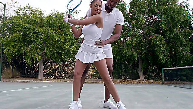 Busty August Ames flirting with her tennis couch
