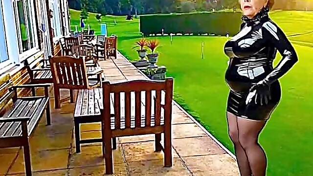 Cathy Golf Course Slut Shiny PVC Plastic Skirt High Heels Stocking Slut Granny Outdoors In Public on The Golf Club Patio In A Plastic Shiny PVC Costume Clothing And High Heels Porn