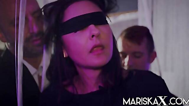 Blindfolded brunette, Mariska is ready to have sex with two guys at the same time