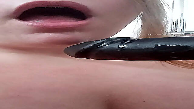 Fat Dutch amateur girl sucks big dildo in spit fetish BJ video