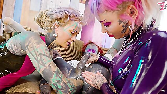 Tattooed trans Lily Lu gets two fists up her ass