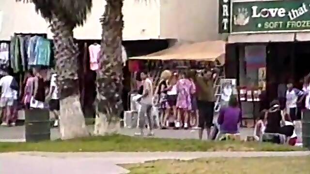 Sexy cougar with long dark hair flashing her hot ass in public