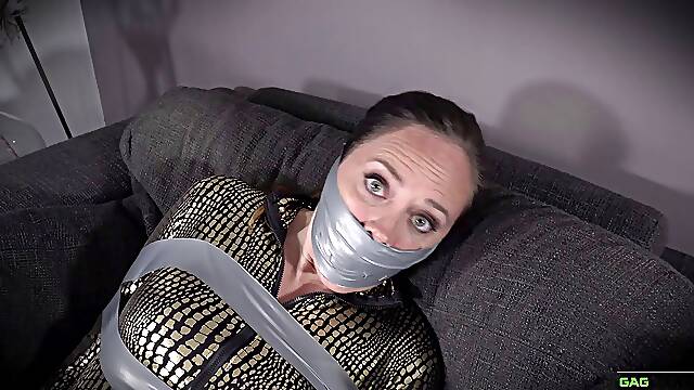 Leila - Catsuit crook in tape bondage